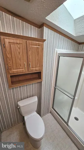 a bathroom with a toilet