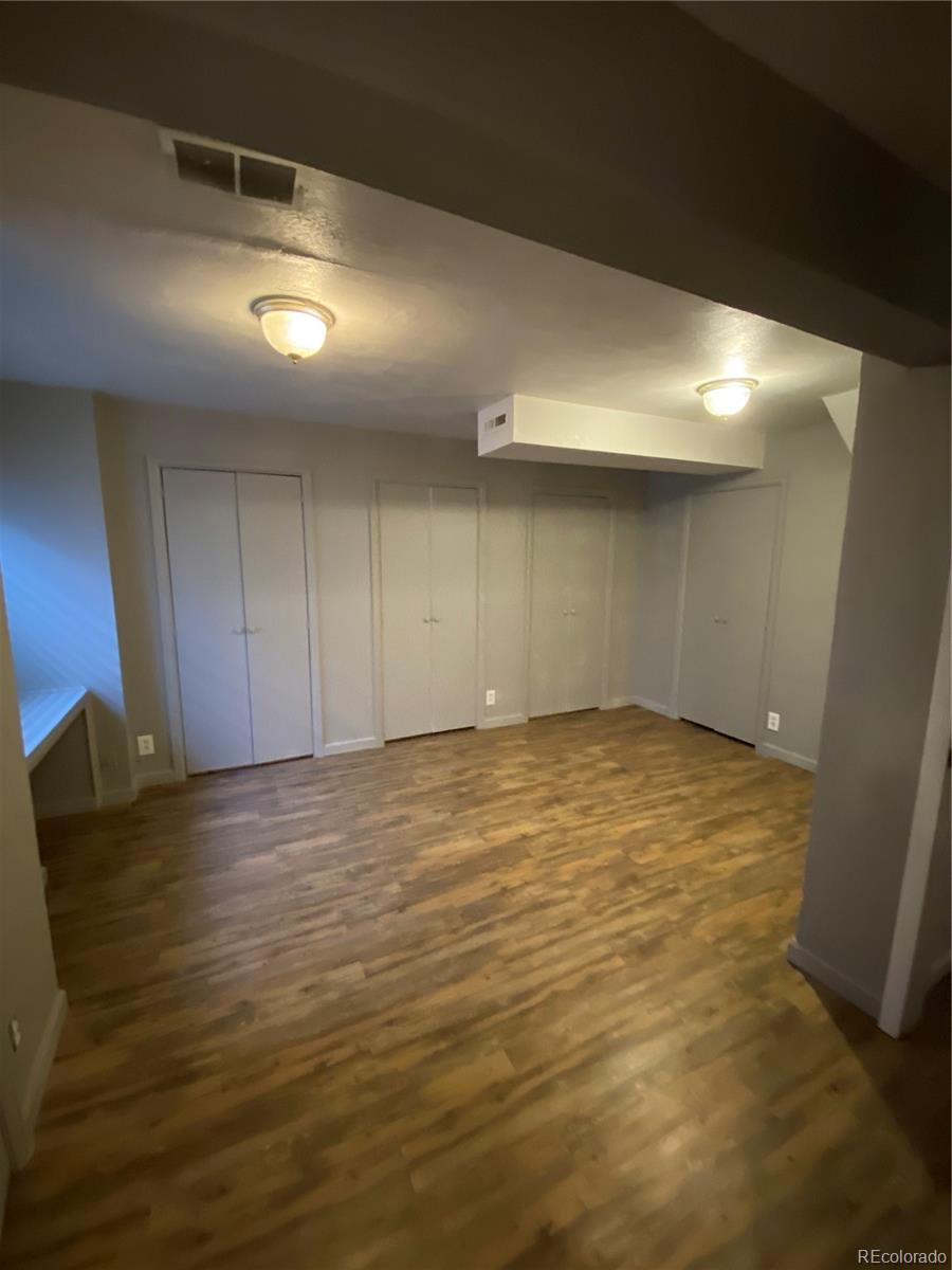 874 Homestead Drive Highlands Ranch, CO 80126 - Photo 5 of 13 a view of an empty room