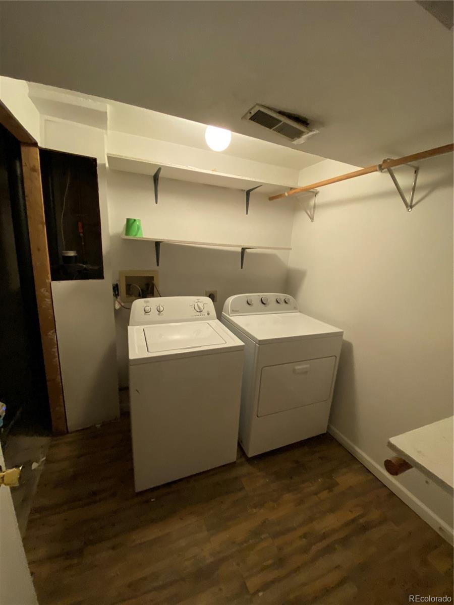 874 Homestead Drive Highlands Ranch, CO 80126 - Photo 8 of 13 a utility room with dryer and washer