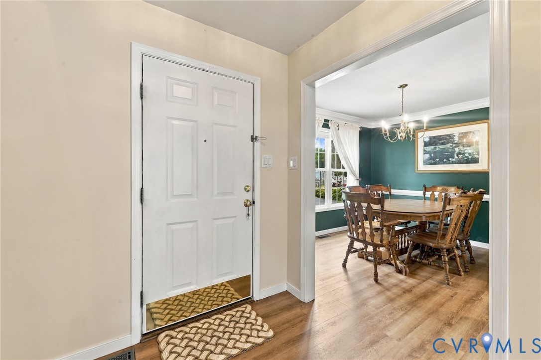 244 East Huntsman Road Sandston, VA 23150 - Photo 9 of 54 Entryway with wood-finish flooring and a white pan