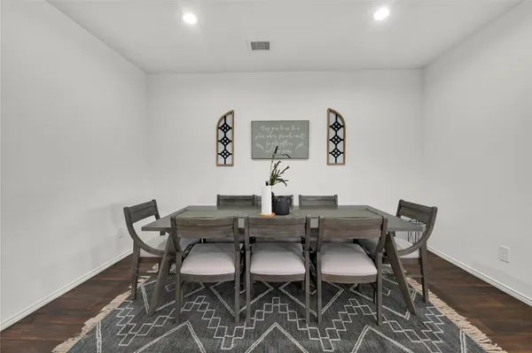 a view of a dining room with furniture