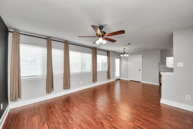 a kitchen with stainless steel appliances cabinets a sink and a stove