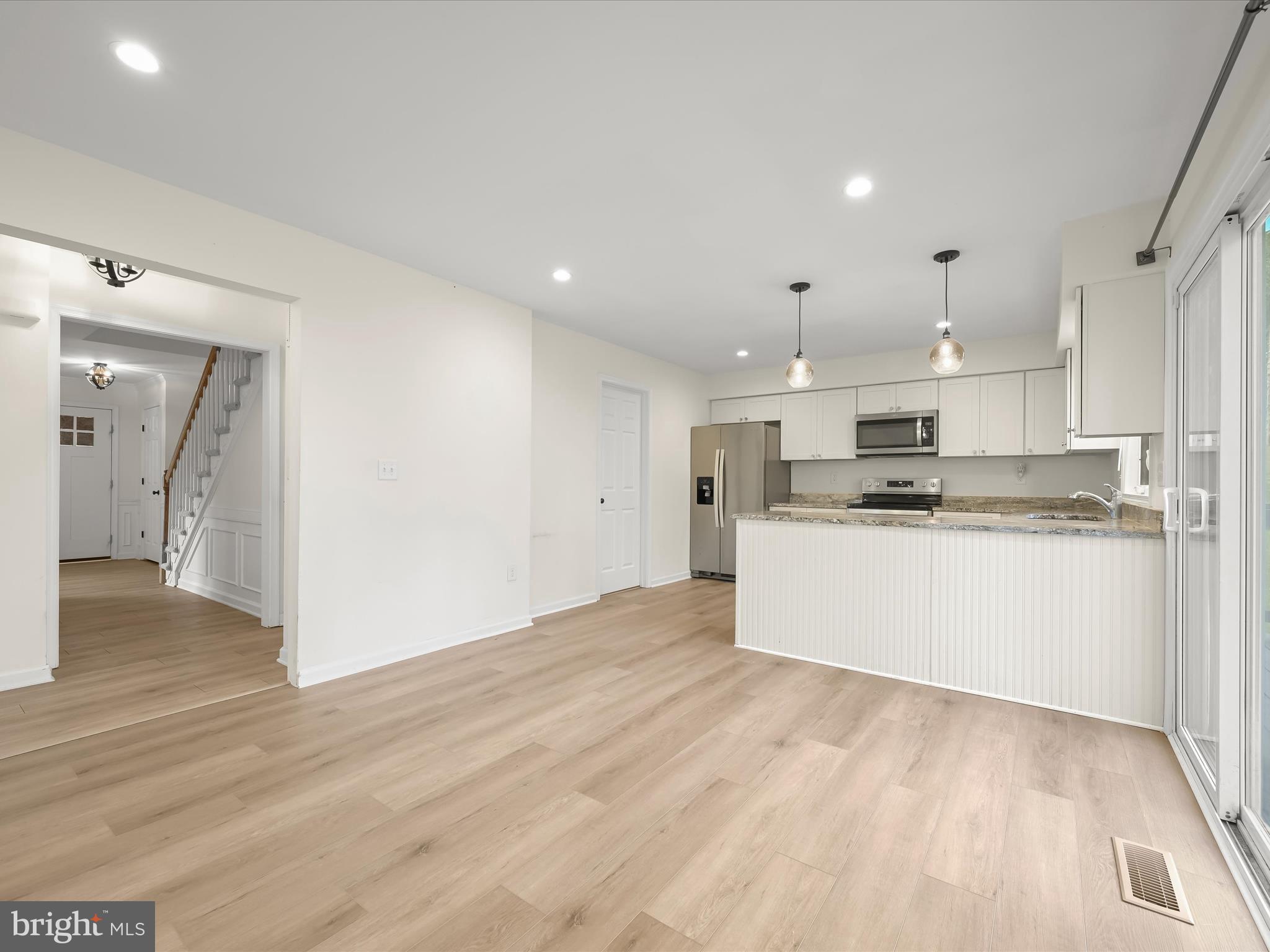 8806 Admiral Drive Laurel, MD 20708 - Photo 17 of 59 a view of kitchen with wooden floor