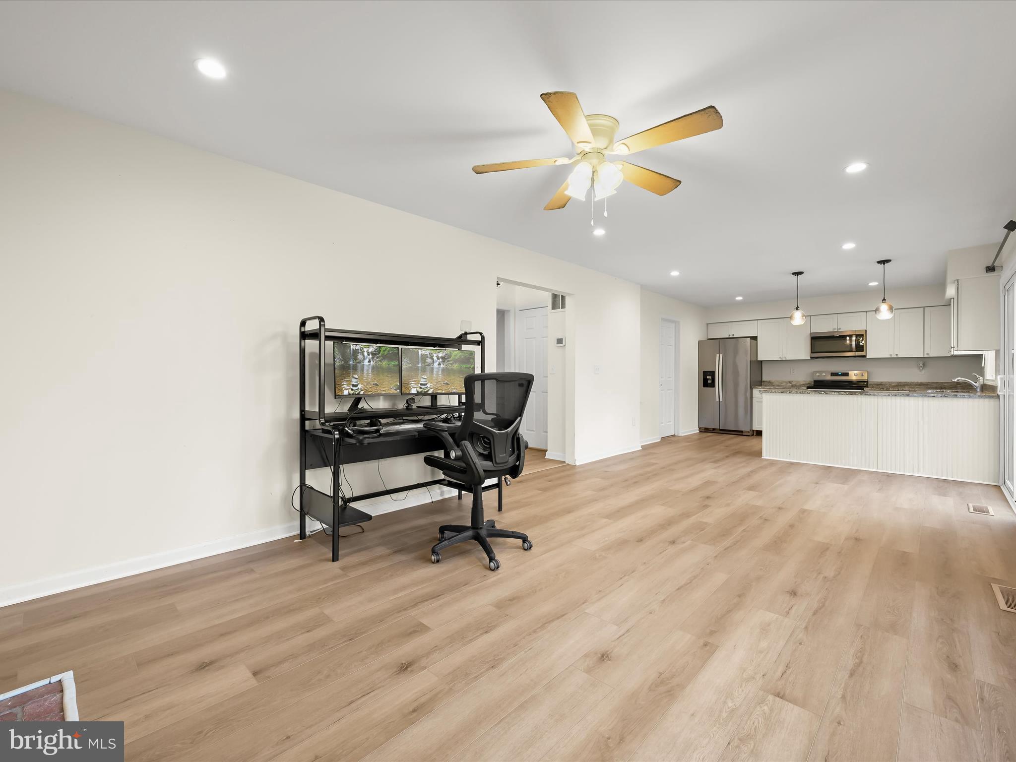 8806 Admiral Drive Laurel, MD 20708 - Photo 59 of 59 a living room with furniture and kitchen view