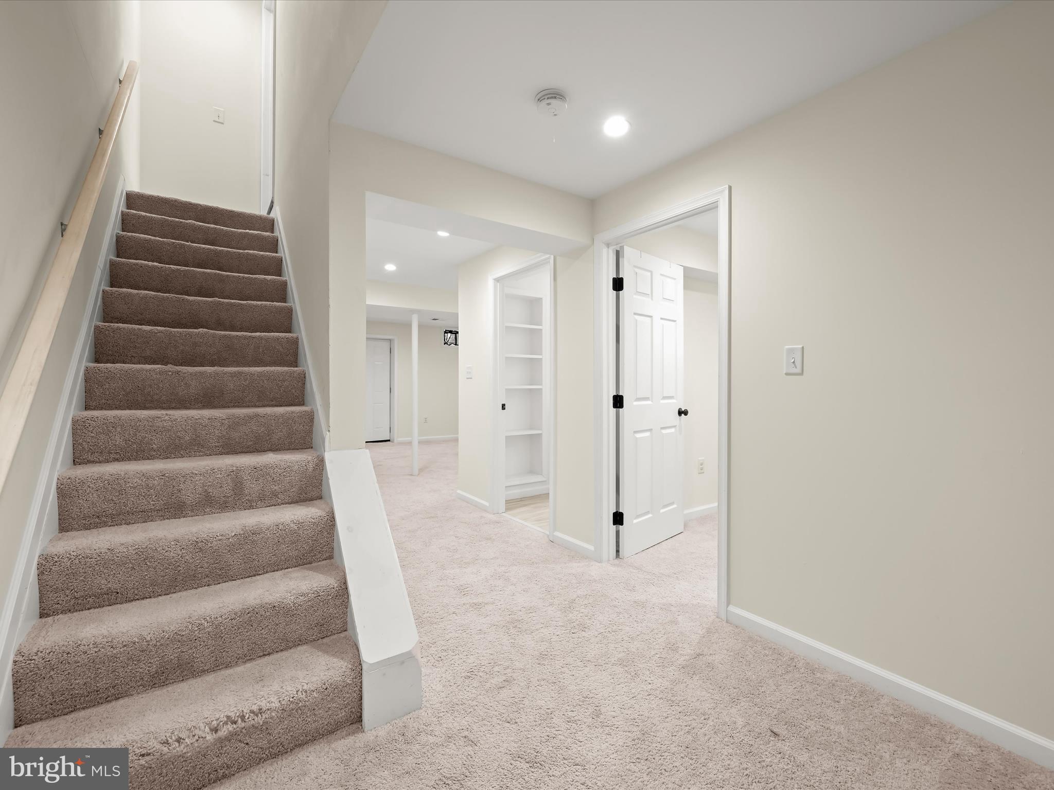 8806 Admiral Drive Laurel, MD 20708 - Photo 34 of 59 a view of an empty room with stairs