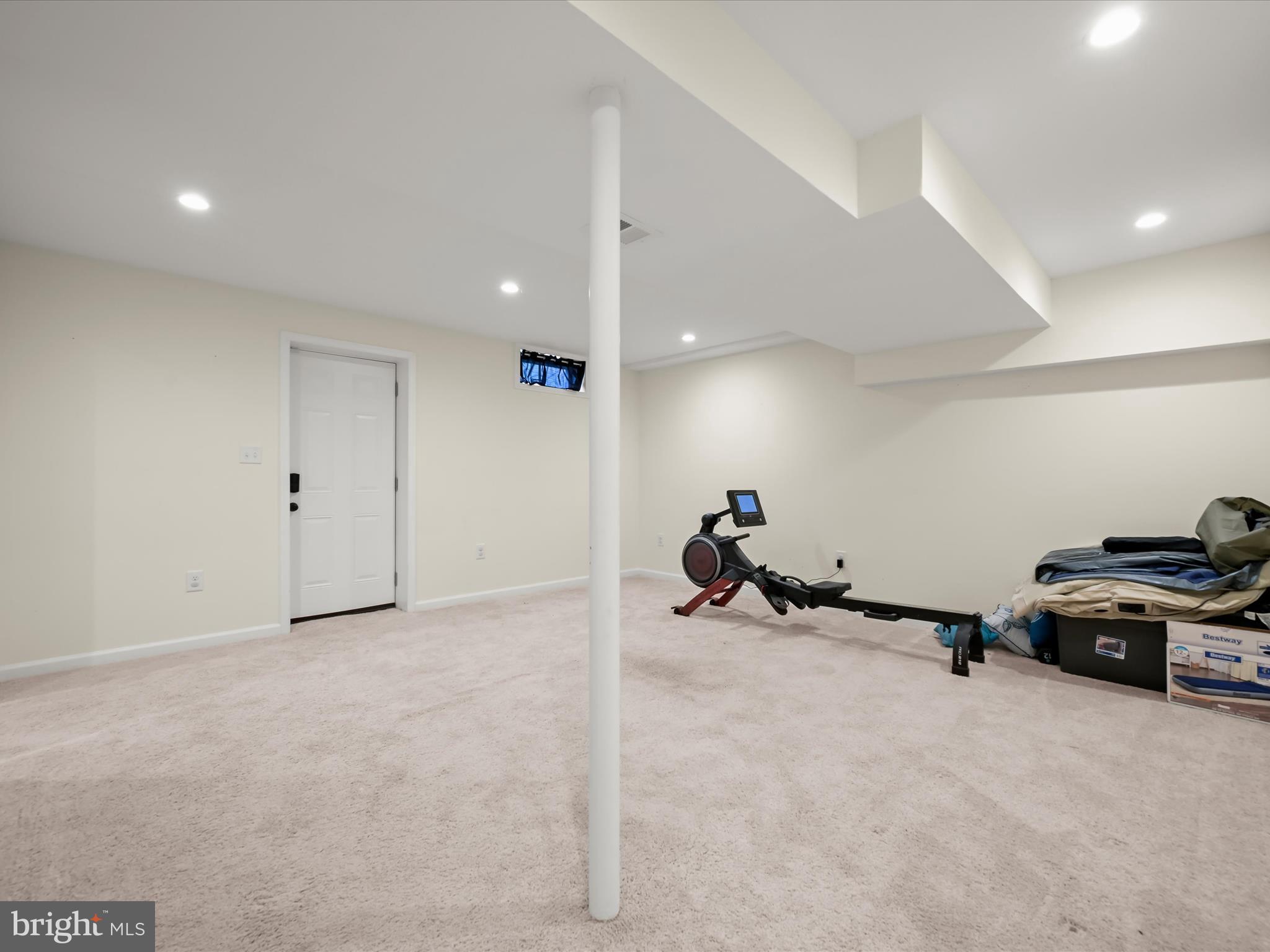 8806 Admiral Drive Laurel, MD 20708 - Photo 35 of 59 a view of a room with gym equipment