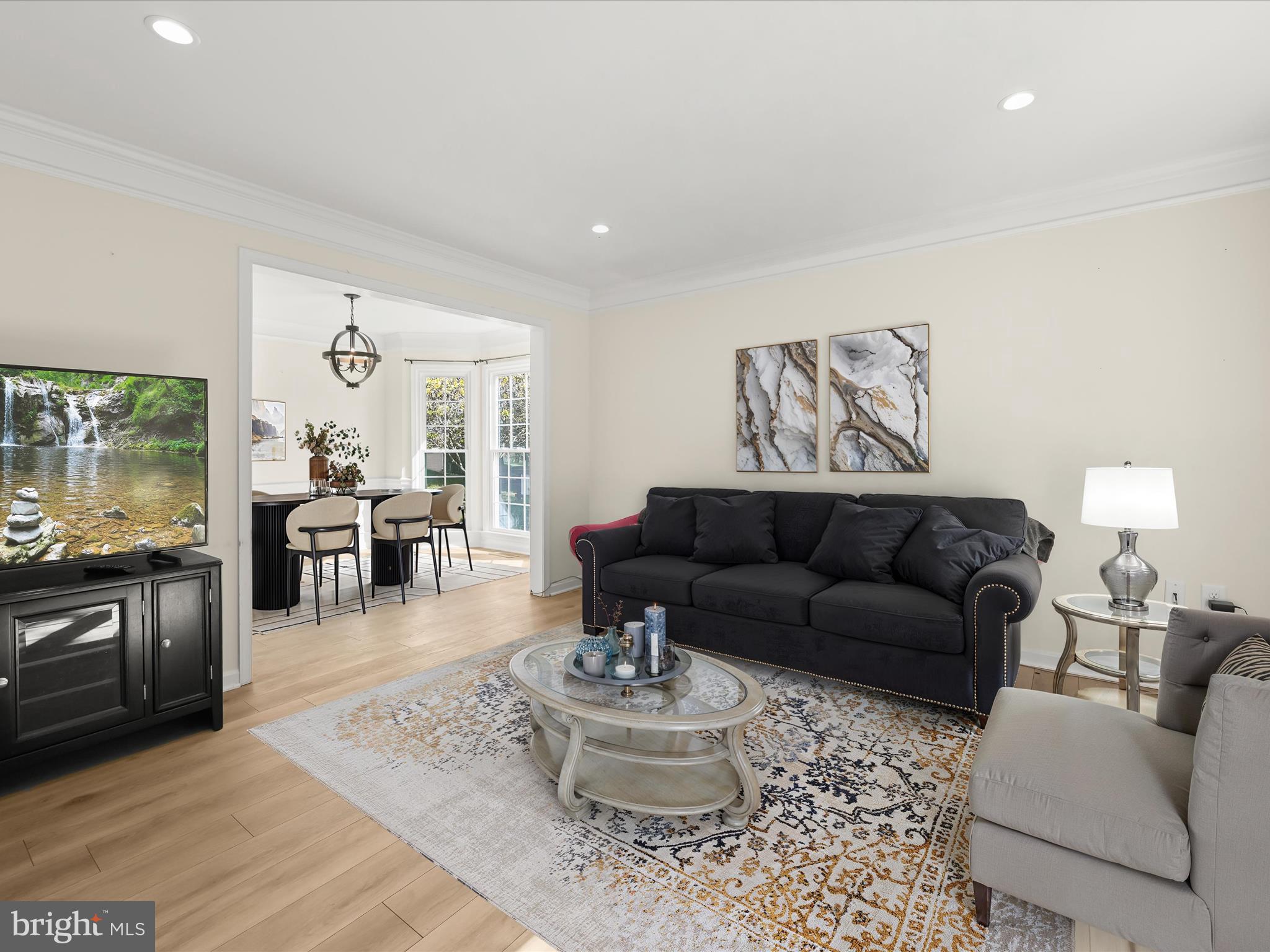8806 Admiral Drive Laurel, MD 20708 - Photo 5 of 59 a living room with furniture and wooden floor