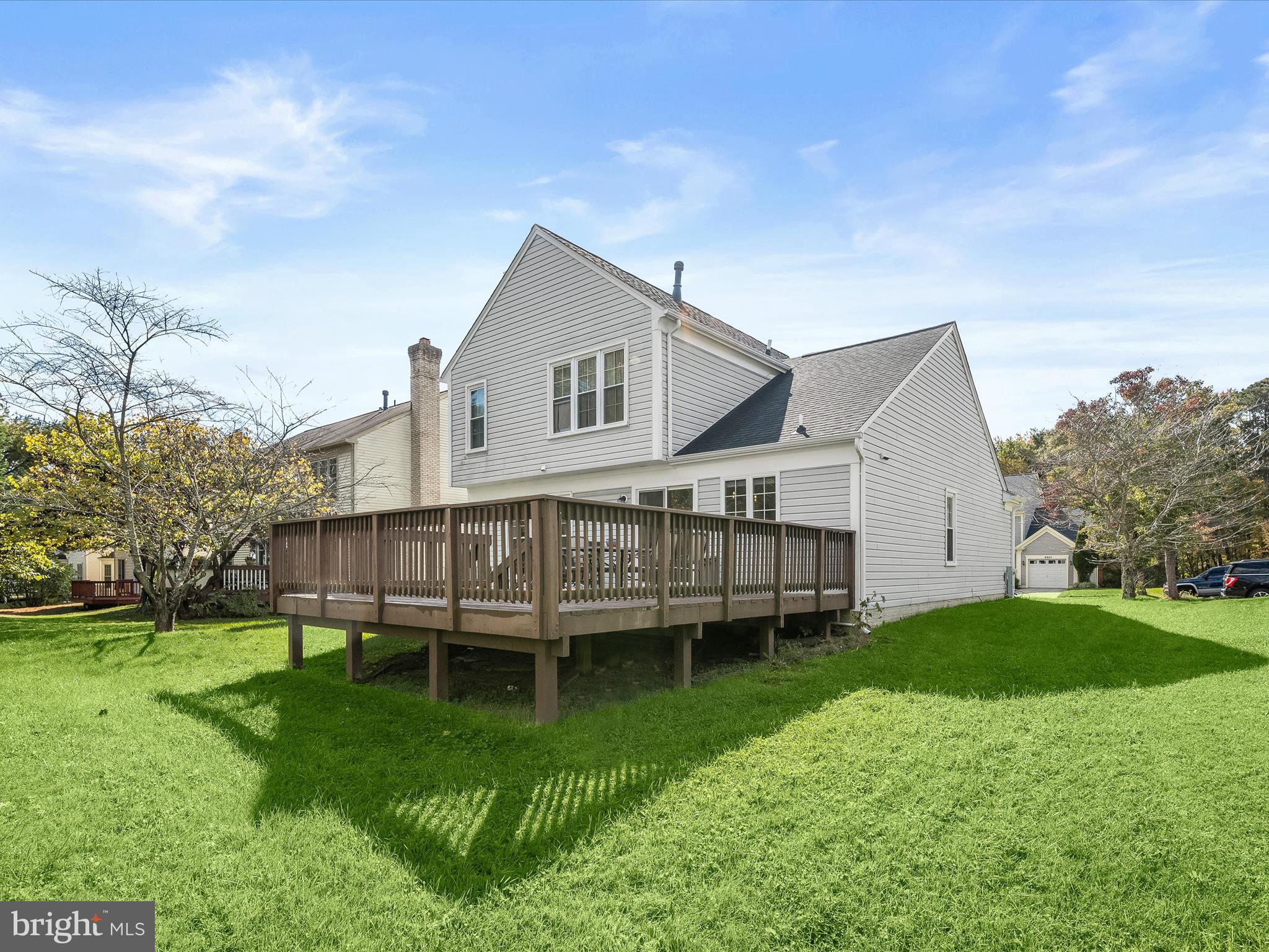 8806 Admiral Drive Laurel, MD 20708 - Photo 8 of 59 a view of a house with a yard and sitting area
