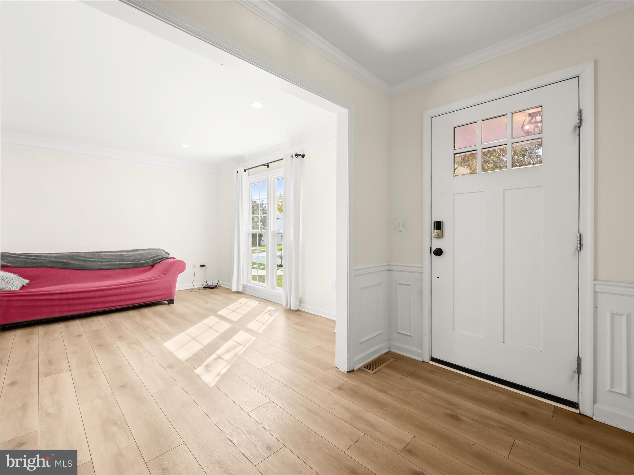 8806 Admiral Drive Laurel, MD 20708 - Photo 9 of 59 a bedroom with a bed and a cabinets