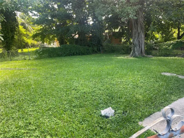 a view of outdoor space and yard