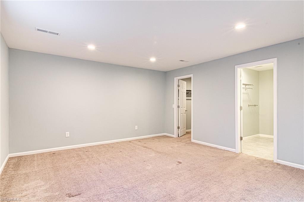 5101 Tower Road Greensboro, NC 27410 - Photo 11 of 36 basement master bedroom