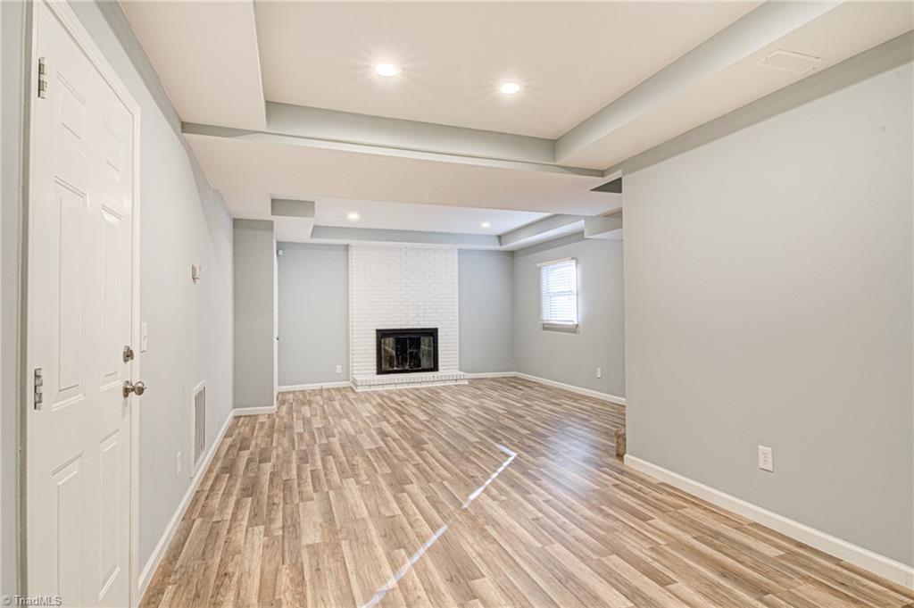 5101 Tower Road Greensboro, NC 27410 - Photo 27 of 36 Den in basement