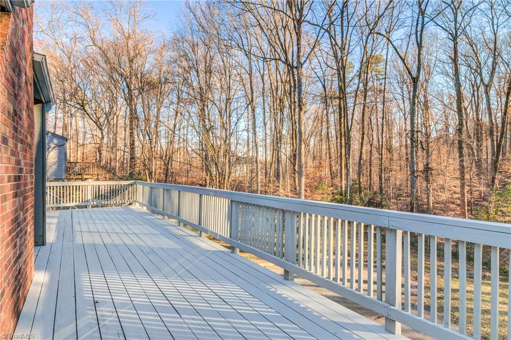 5101 Tower Road Greensboro, NC 27410 - Photo 31 of 36 Huge deck almost like being in the trees