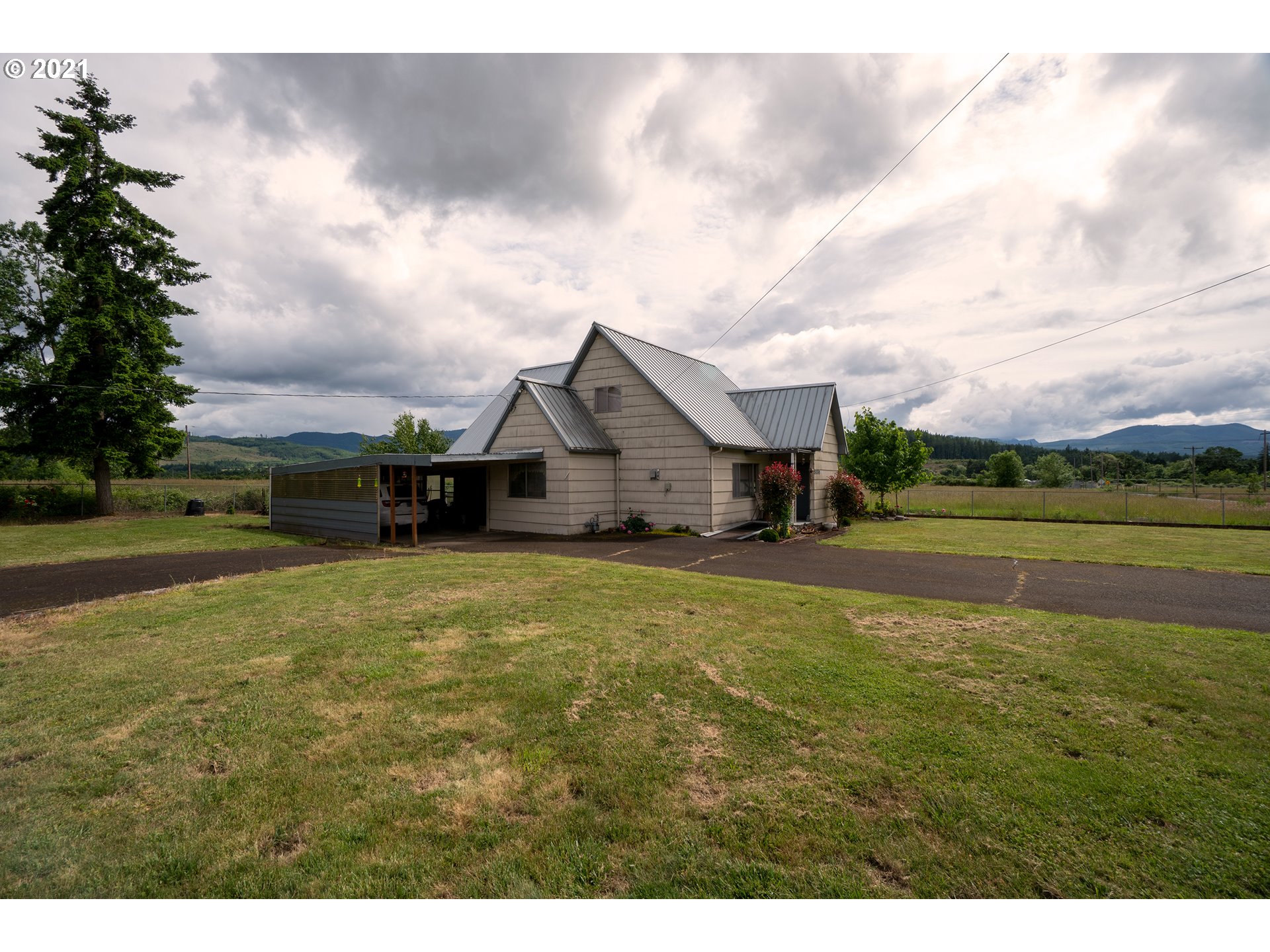 9040 Fort Hill Road Willamina, OR 97396 - Photo 12 of 27 a aerial view of a house with a yard