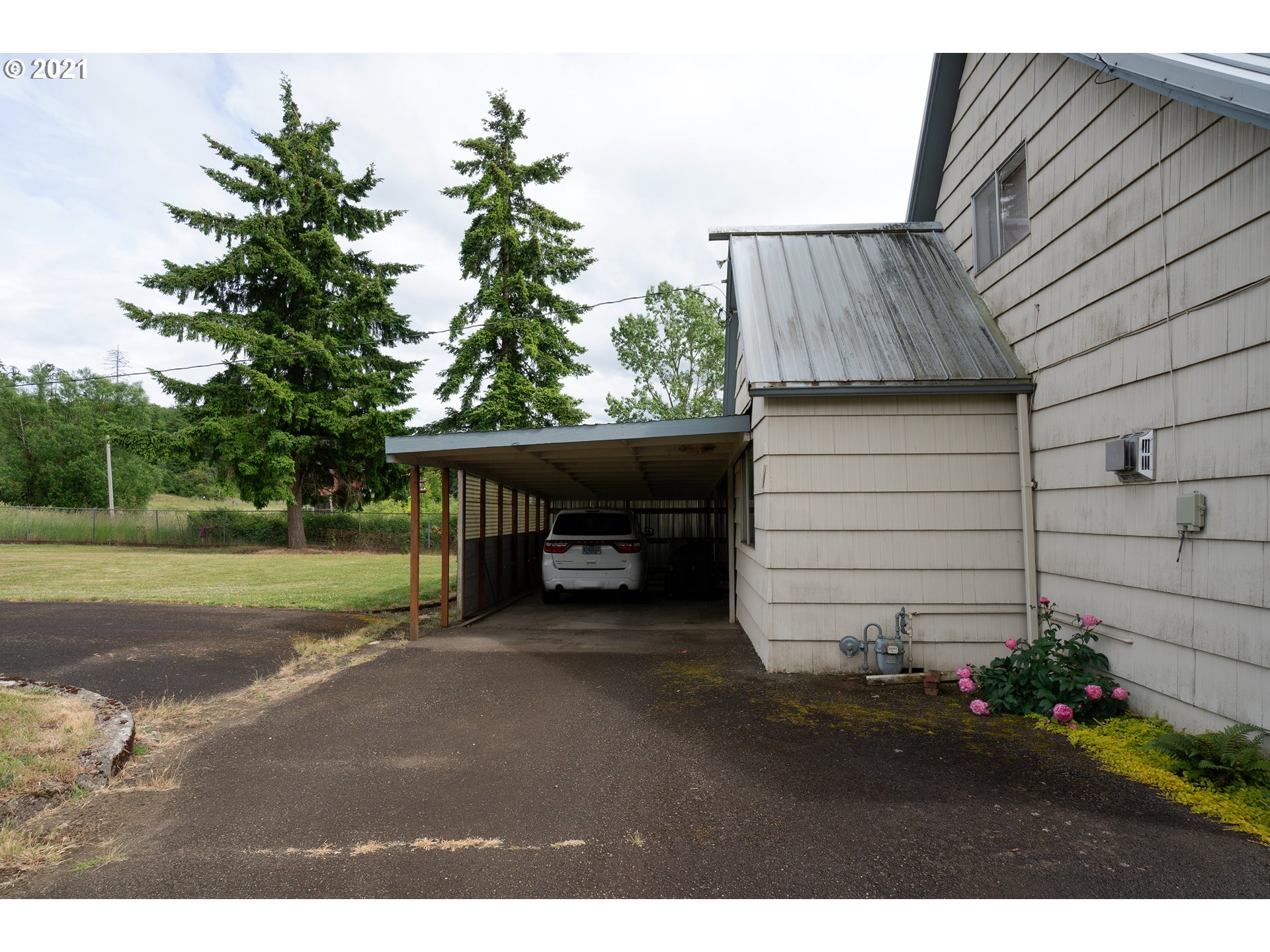 9040 Fort Hill Road Willamina, OR 97396 - Photo 13 of 27 a view of a house with a backyard