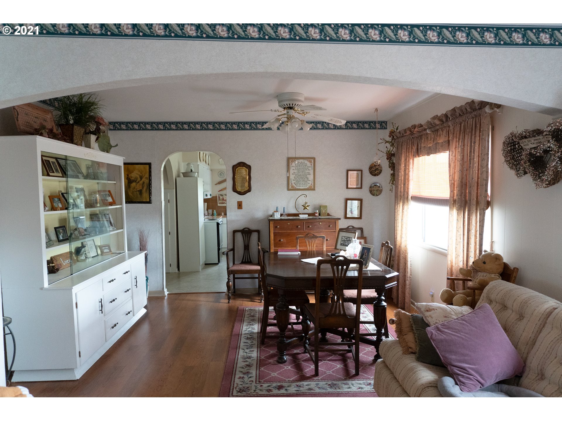 9040 Fort Hill Road Willamina, OR 97396 - Photo 15 of 27 a living room with furniture and a large window