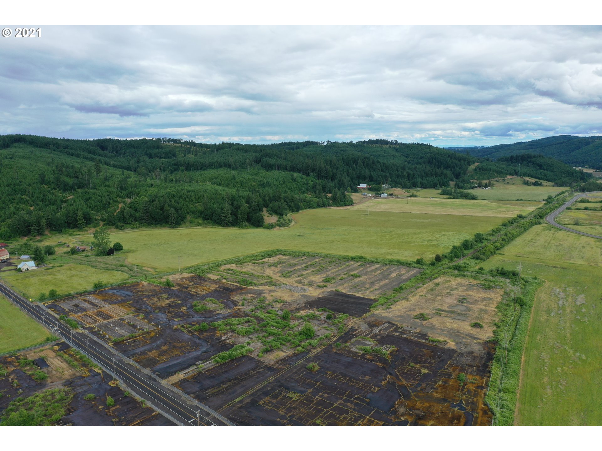 9040 Fort Hill Road Willamina, OR 97396 - Photo 7 of 27 a view of a lake with beach