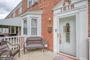 1618 Roundhill Road Baltimore, MD 21218 - Photo 3 of 50 a view of a house with a porch