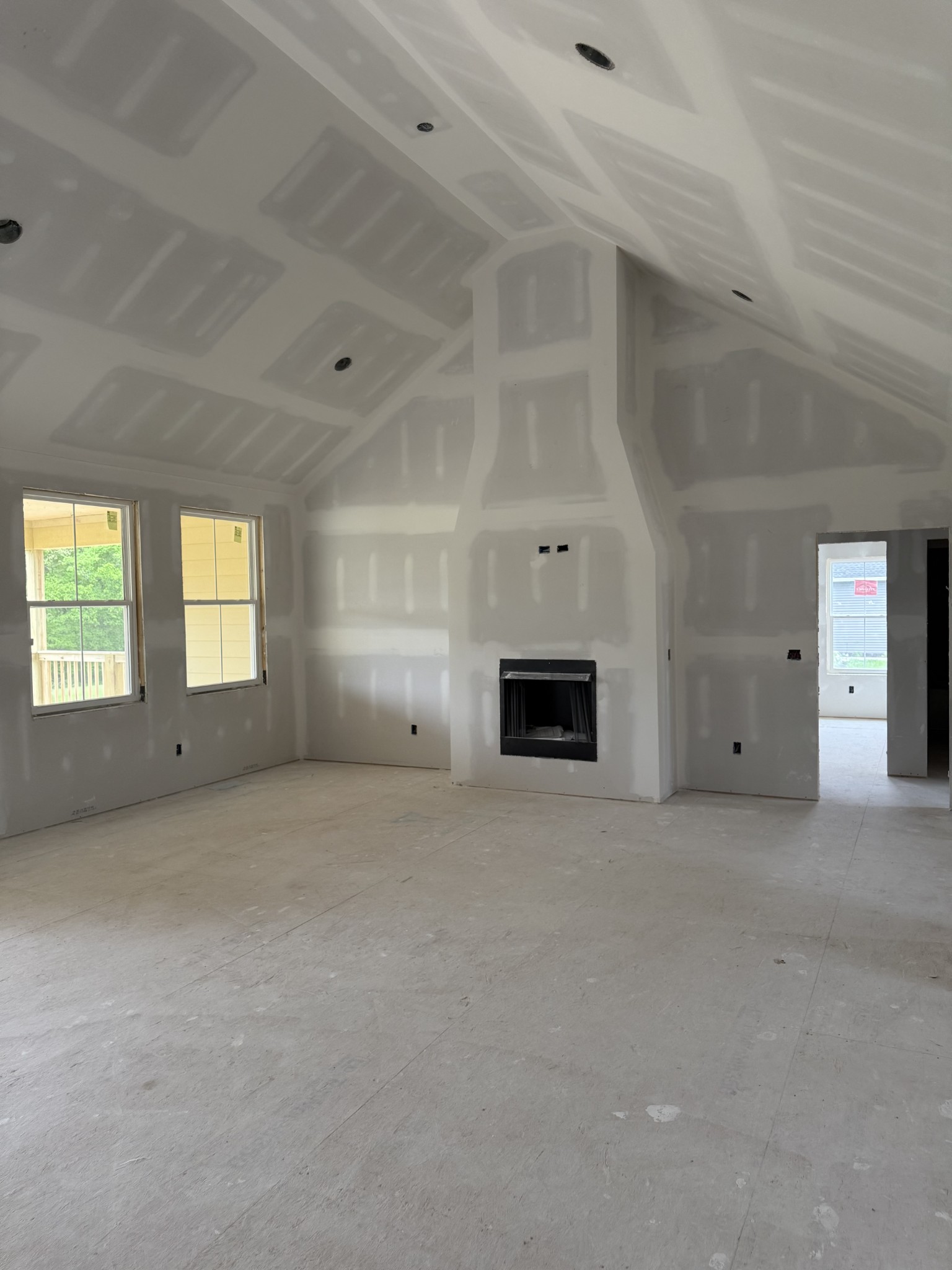8680 Middle Lick Creek Road Lyles, TN 37098 - Photo 7 of 38 a view of empty room with a fireplace