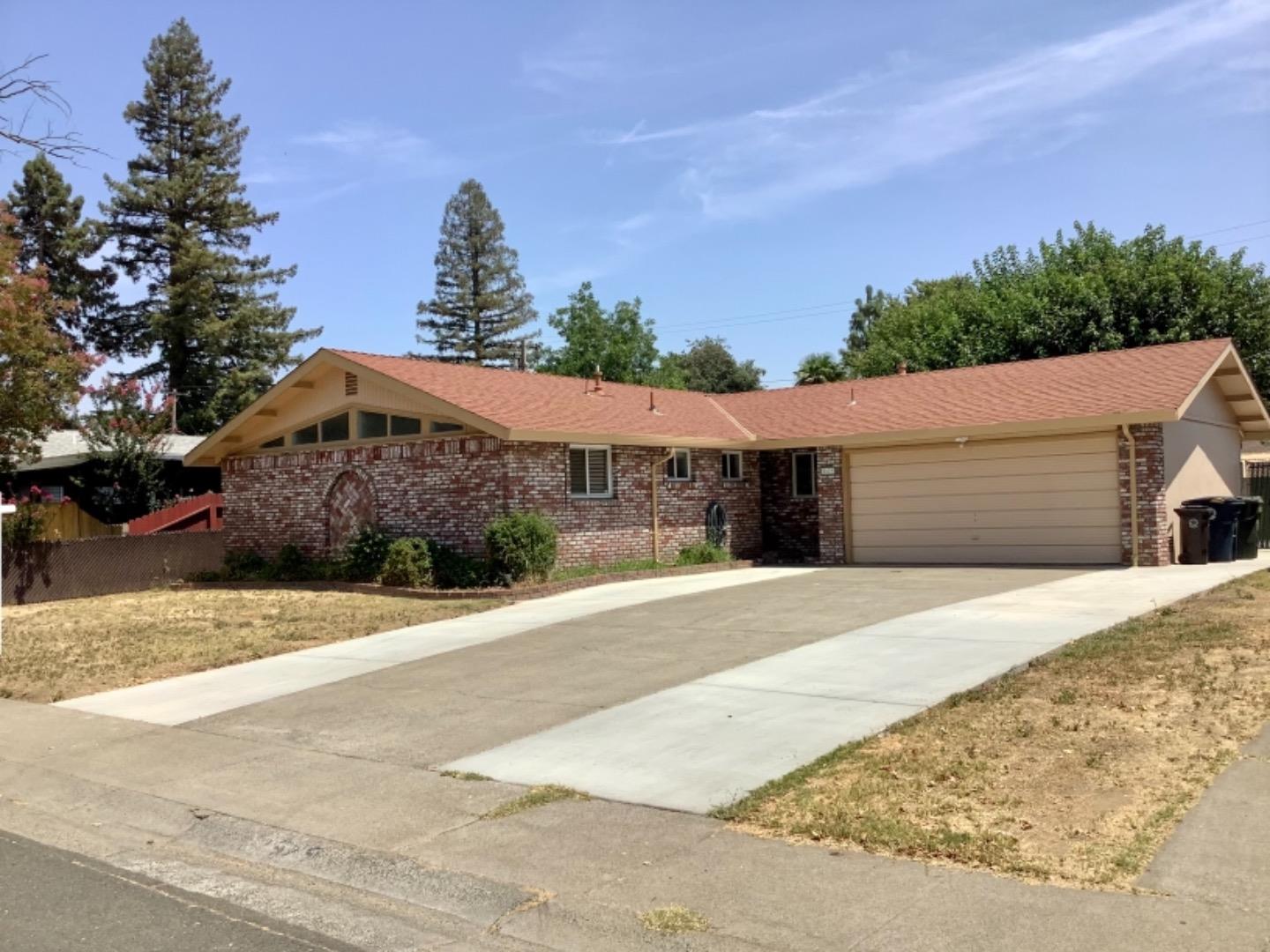 2629 El Segundo Drive Rancho Cordova, CA 95670 - Photo 2 of 63 a front view of a house with a yard and garage