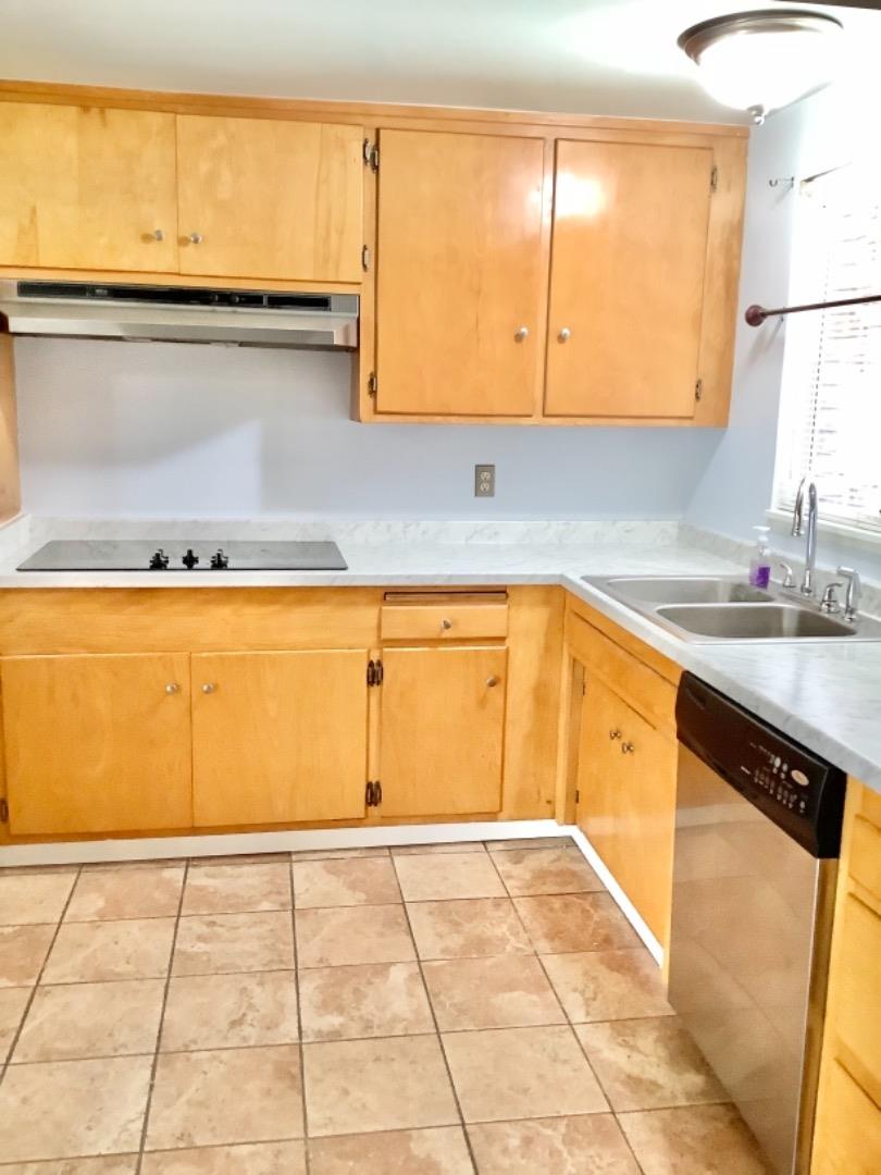 2629 El Segundo Drive Rancho Cordova, CA 95670 - Photo 21 of 63 a view of a kitchen with kitchen island sink and cabinets