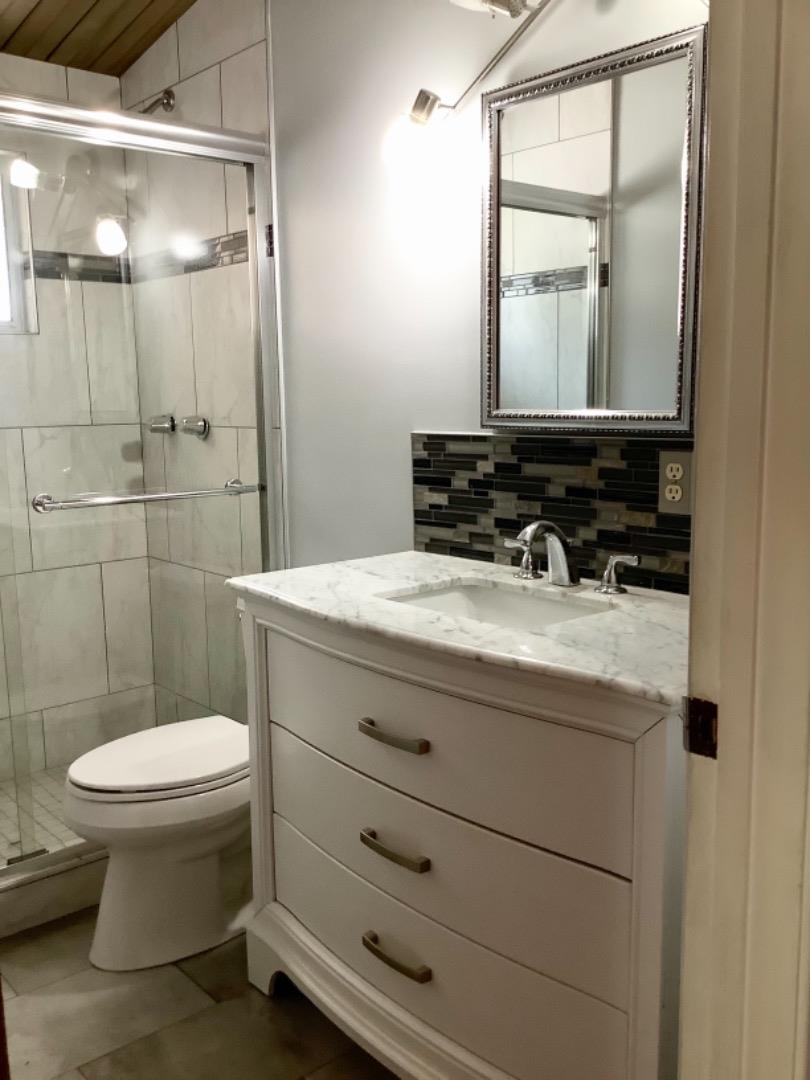 2629 El Segundo Drive Rancho Cordova, CA 95670 - Photo 33 of 63 a bathroom with a sink toilet and mirror
