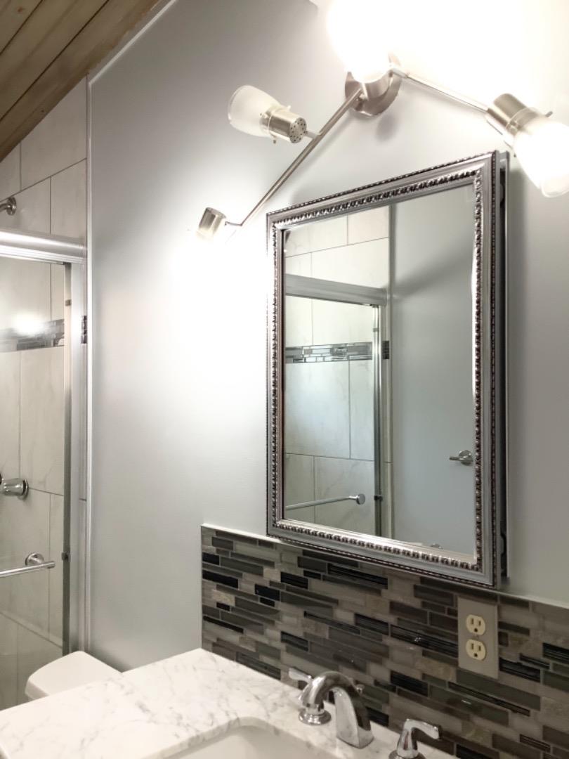 2629 El Segundo Drive Rancho Cordova, CA 95670 - Photo 34 of 63 a bathroom with a sink and a mirror