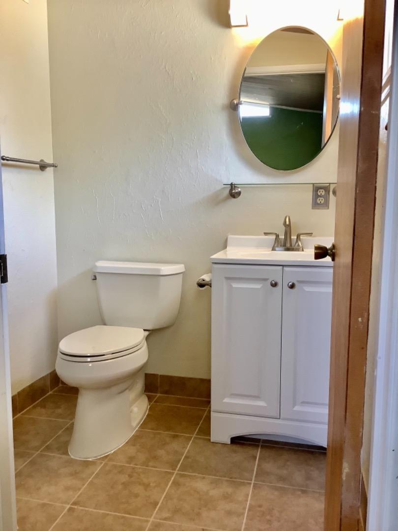 2629 El Segundo Drive Rancho Cordova, CA 95670 - Photo 51 of 63 a bathroom with a toilet and a mirror