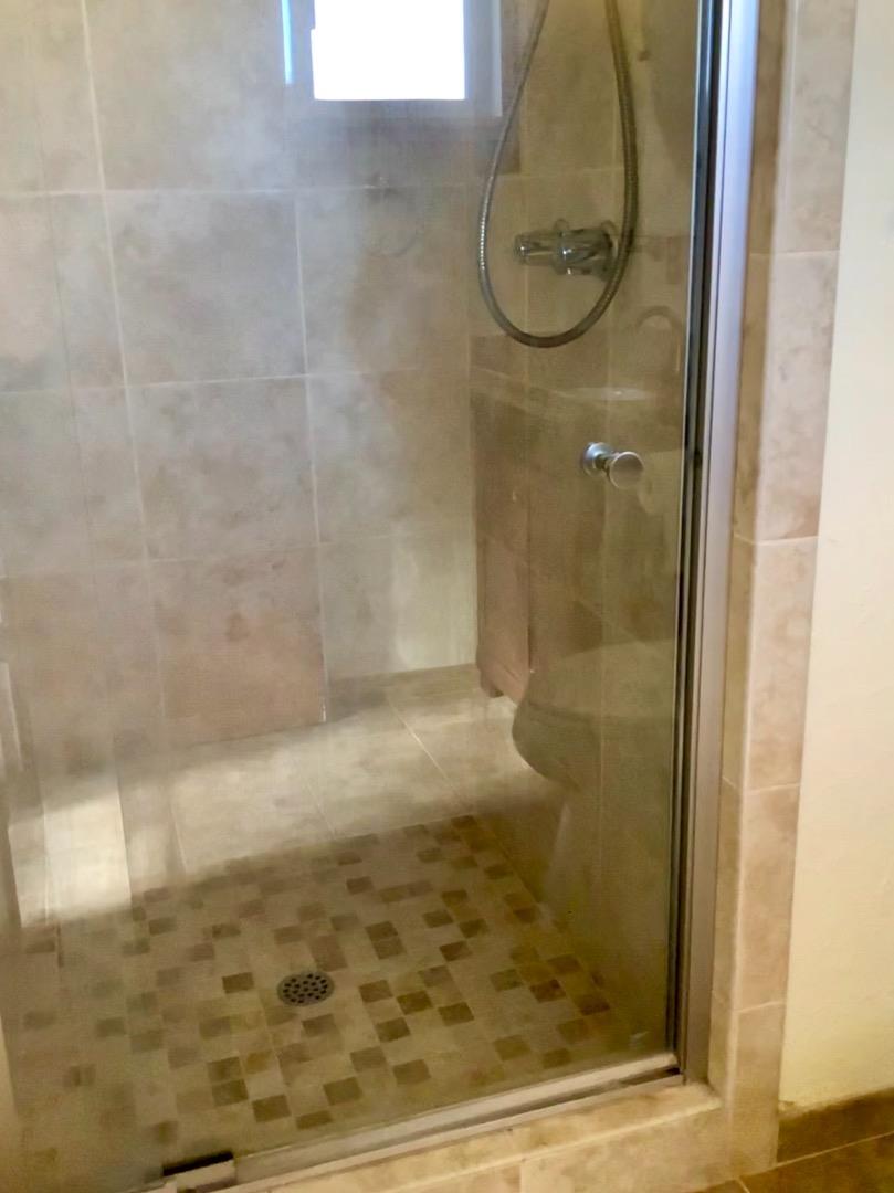 2629 El Segundo Drive Rancho Cordova, CA 95670 - Photo 55 of 63 a bathroom with a glass shower door