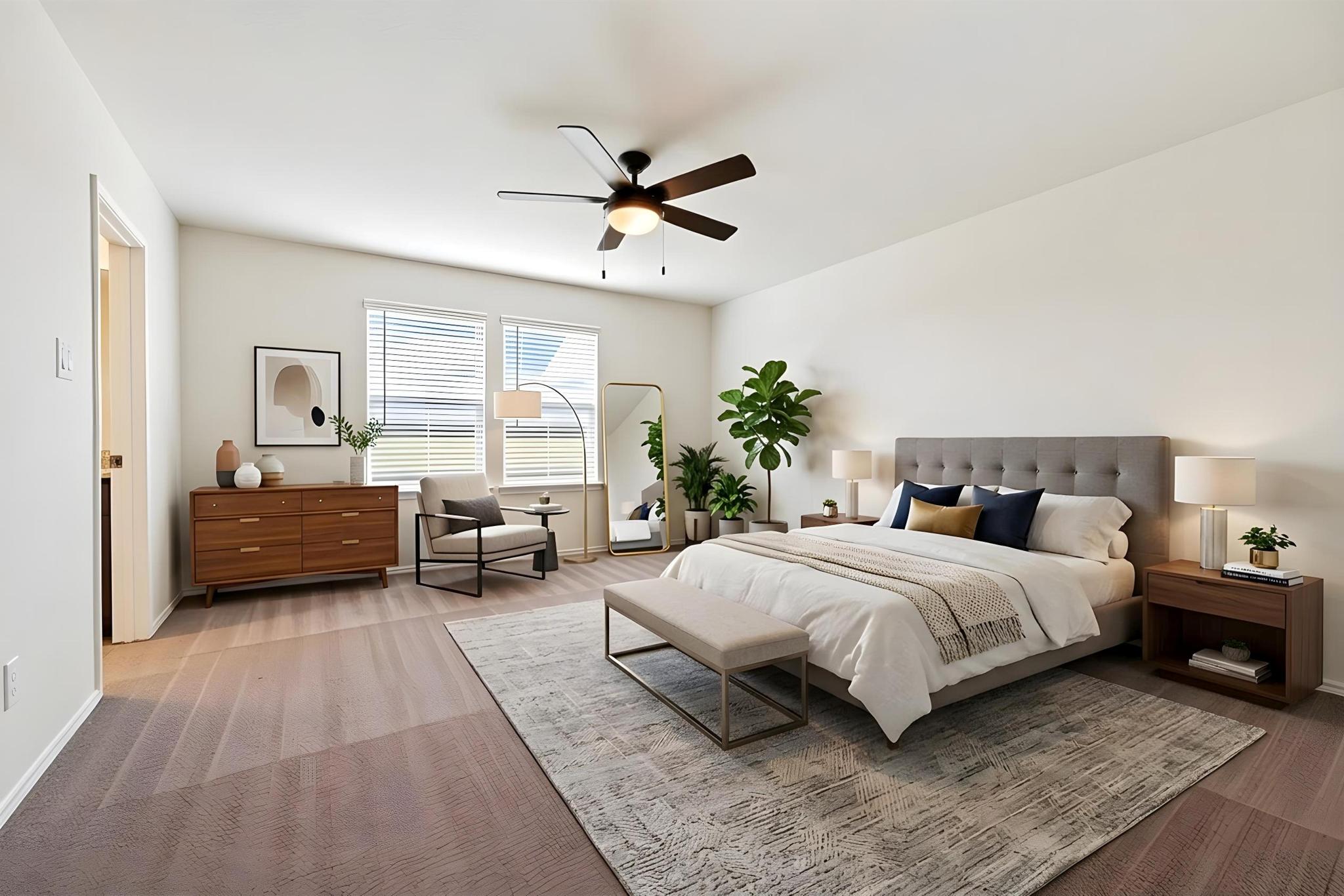 217 Innisfree Road Jarrell, TX 76537 - Photo 23 of 39 A spacious primary bedroom with a ceiling fan offers comfort and direct access to a private bath. Virtually Staged