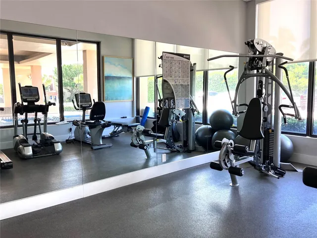 a view of a room with gym equipment