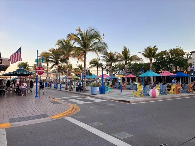 a view of outdoor space with swings and slides