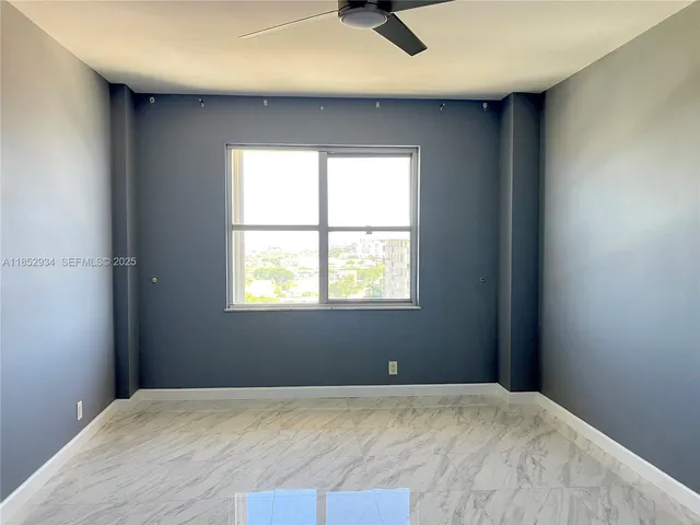 a view of a livingroom with a window