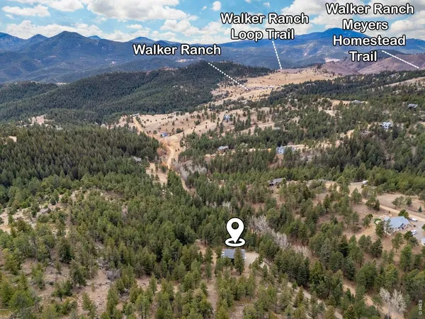a view of mountains and valleys
