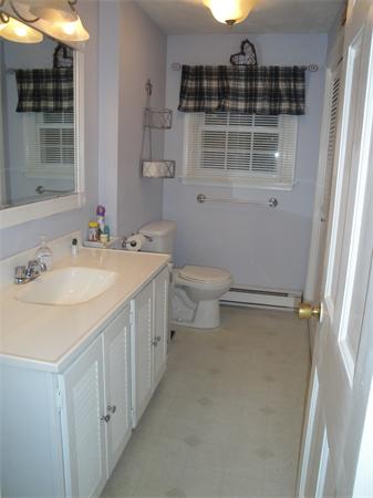 82 Campground Road Sterling, MA 01564 - Photo 13 of 23 a bathroom with a sink a toilet and shower