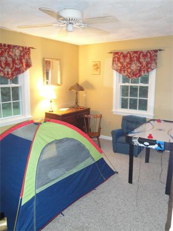 82 Campground Road Sterling, MA 01564 - Photo 20 of 23 a living room with a bed and a table