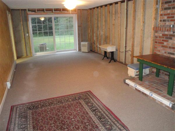 82 Campground Road Sterling, MA 01564 - Photo 22 of 23 a view of a room with door and windows