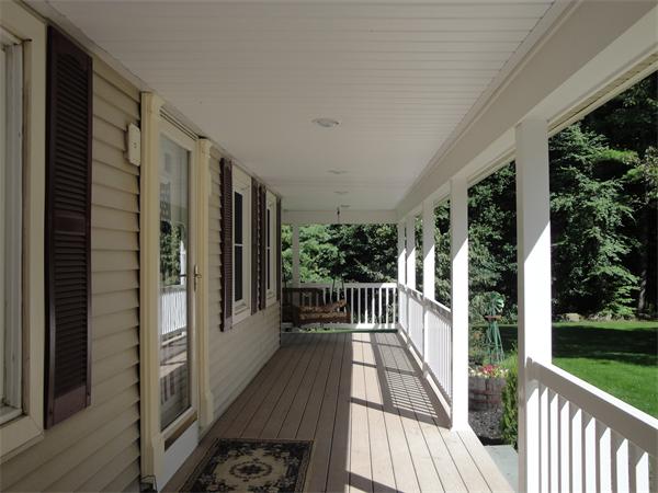 82 Campground Road Sterling, MA 01564 - Photo 3 of 23 a view of a balcony with wooden floor