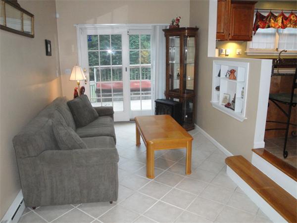 82 Campground Road Sterling, MA 01564 - Photo 7 of 23 a living room with furniture and a flat screen tv