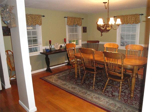 82 Campground Road Sterling, MA 01564 - Photo 9 of 23 a dining room with furniture and wooden floor