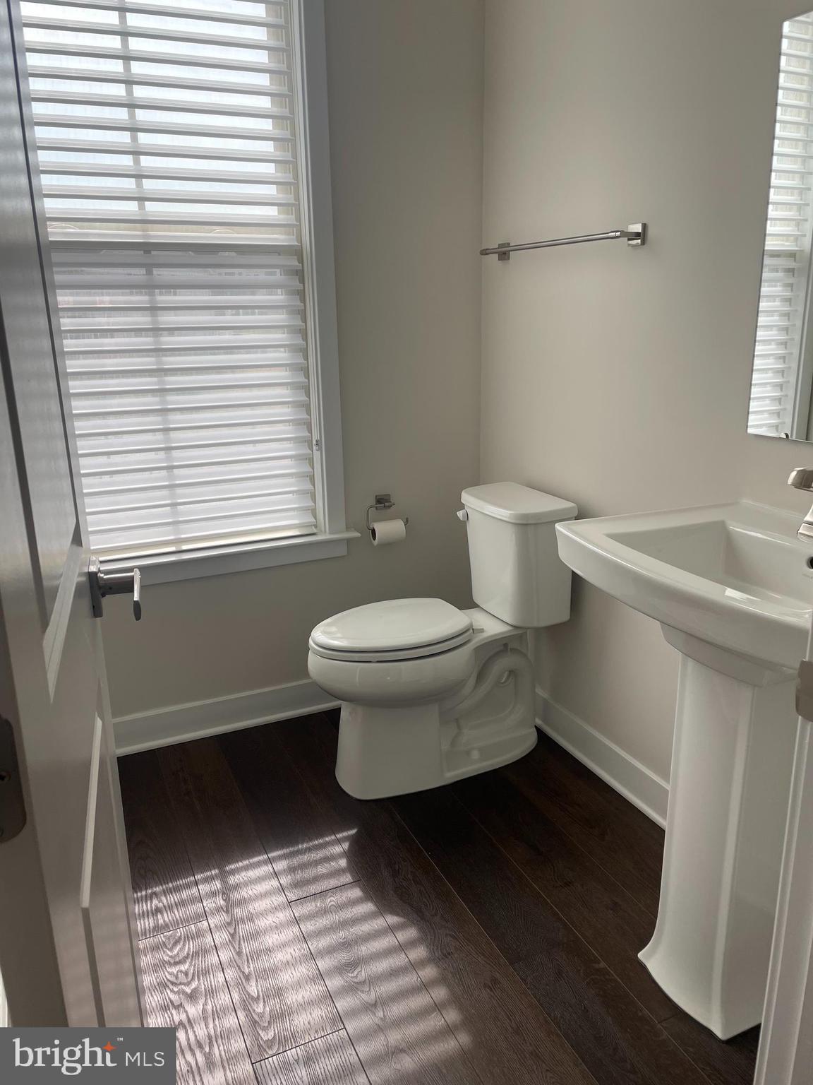 4607 Plum Road Monrovia, MD 21770 - Photo 15 of 52 a bathroom with a sink toilet and window