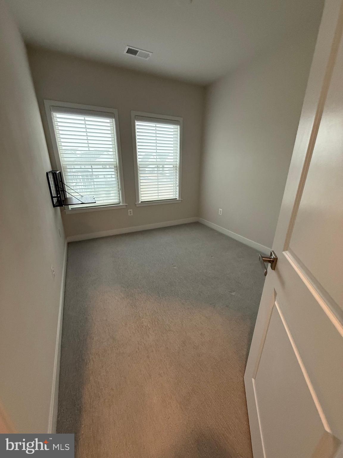 4607 Plum Road Monrovia, MD 21770 - Photo 19 of 52 an empty room with windows