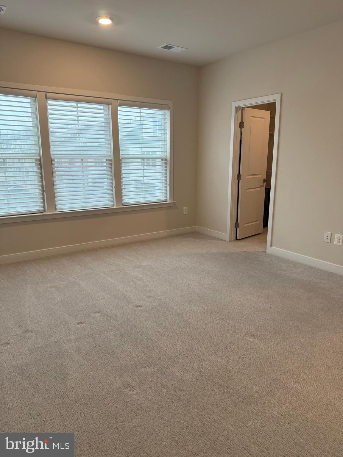 4607 Plum Road Monrovia, MD 21770 - Photo 28 of 52 an empty room with windows