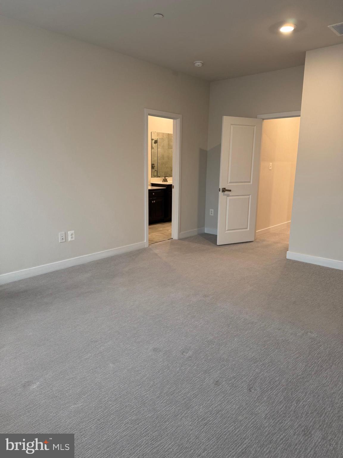 4607 Plum Road Monrovia, MD 21770 - Photo 30 of 52 a view of an empty room and a kitchen