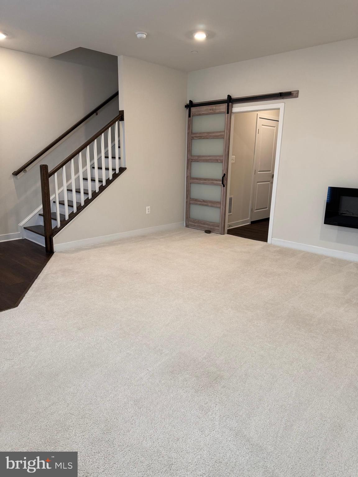 4607 Plum Road Monrovia, MD 21770 - Photo 40 of 52 a view of an empty room with stairs