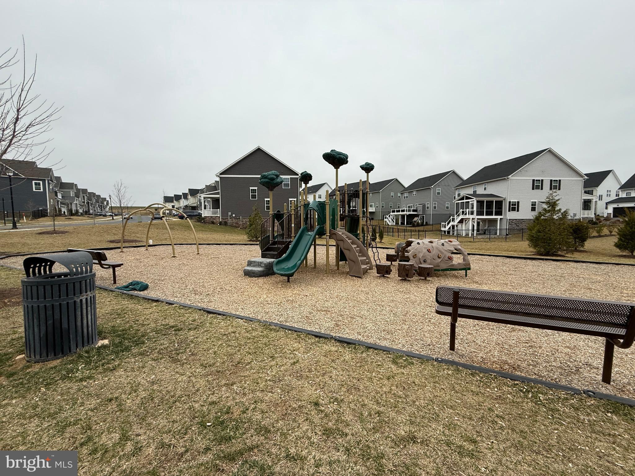 4607 Plum Road Monrovia, MD 21770 - Photo 48 of 52 a park view with a bench in front of house