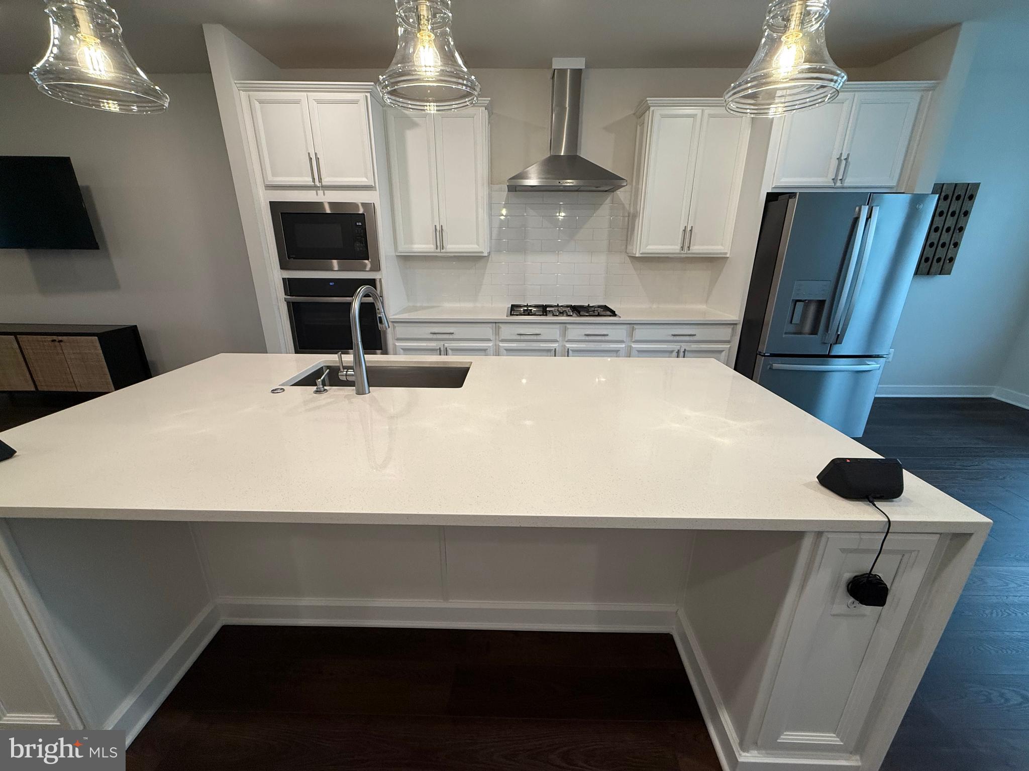 4607 Plum Road Monrovia, MD 21770 - Photo 5 of 52 a kitchen with a sink a refrigerator and a stove