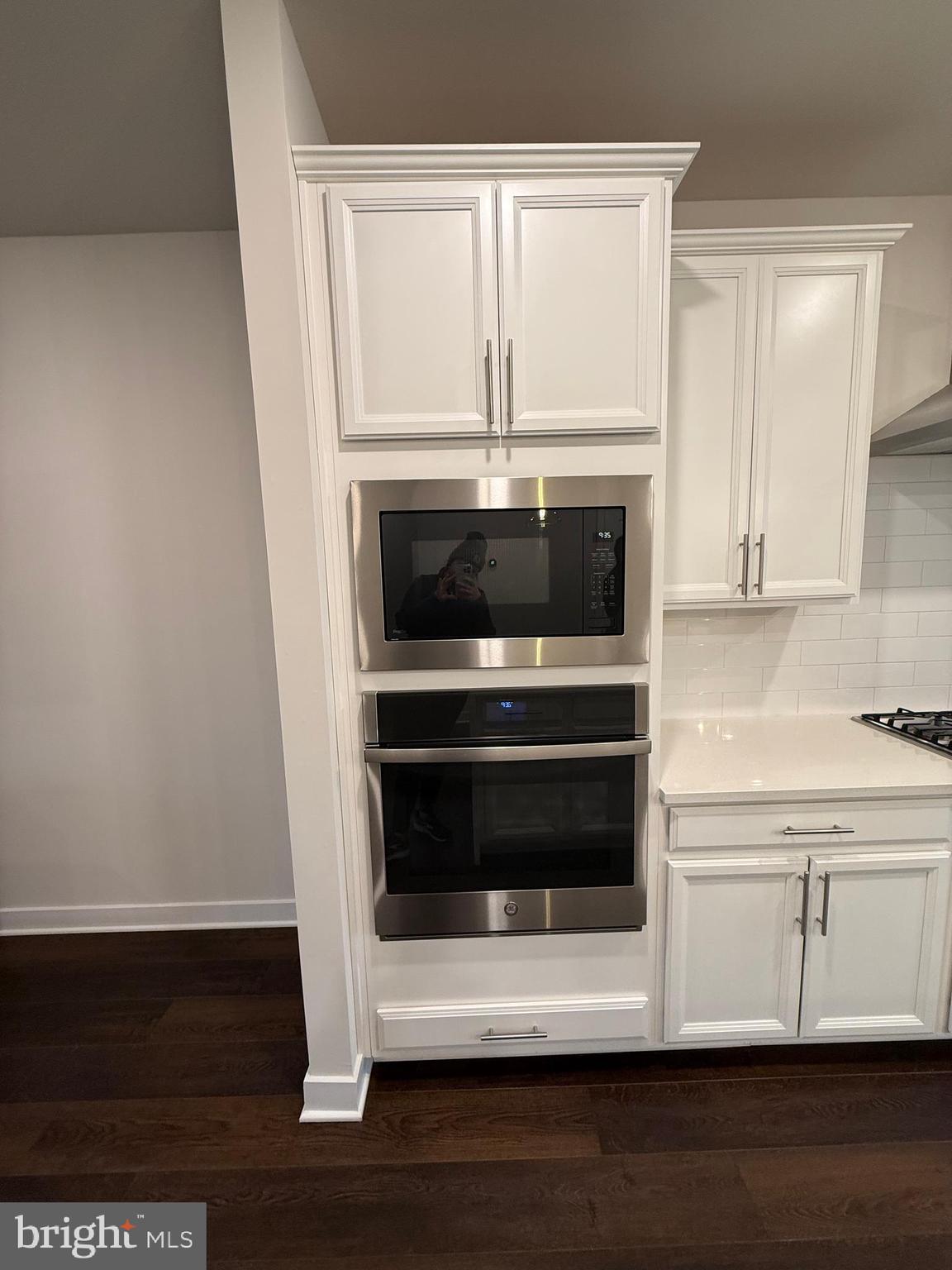 4607 Plum Road Monrovia, MD 21770 - Photo 6 of 52 a kitchen with a stove and a microwave