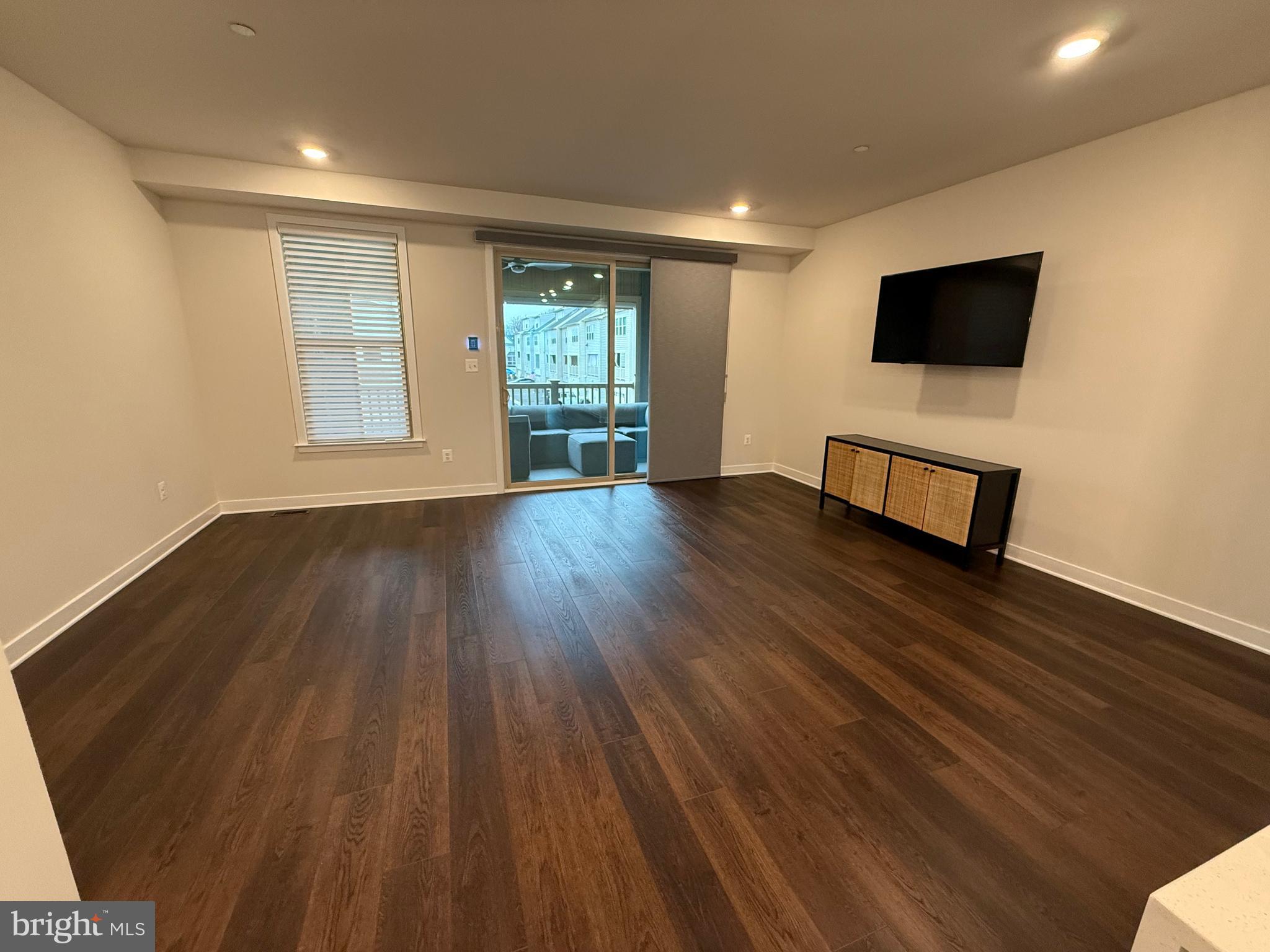 4607 Plum Road Monrovia, MD 21770 - Photo 10 of 52 a view of a livingroom with wooden floor and furniture