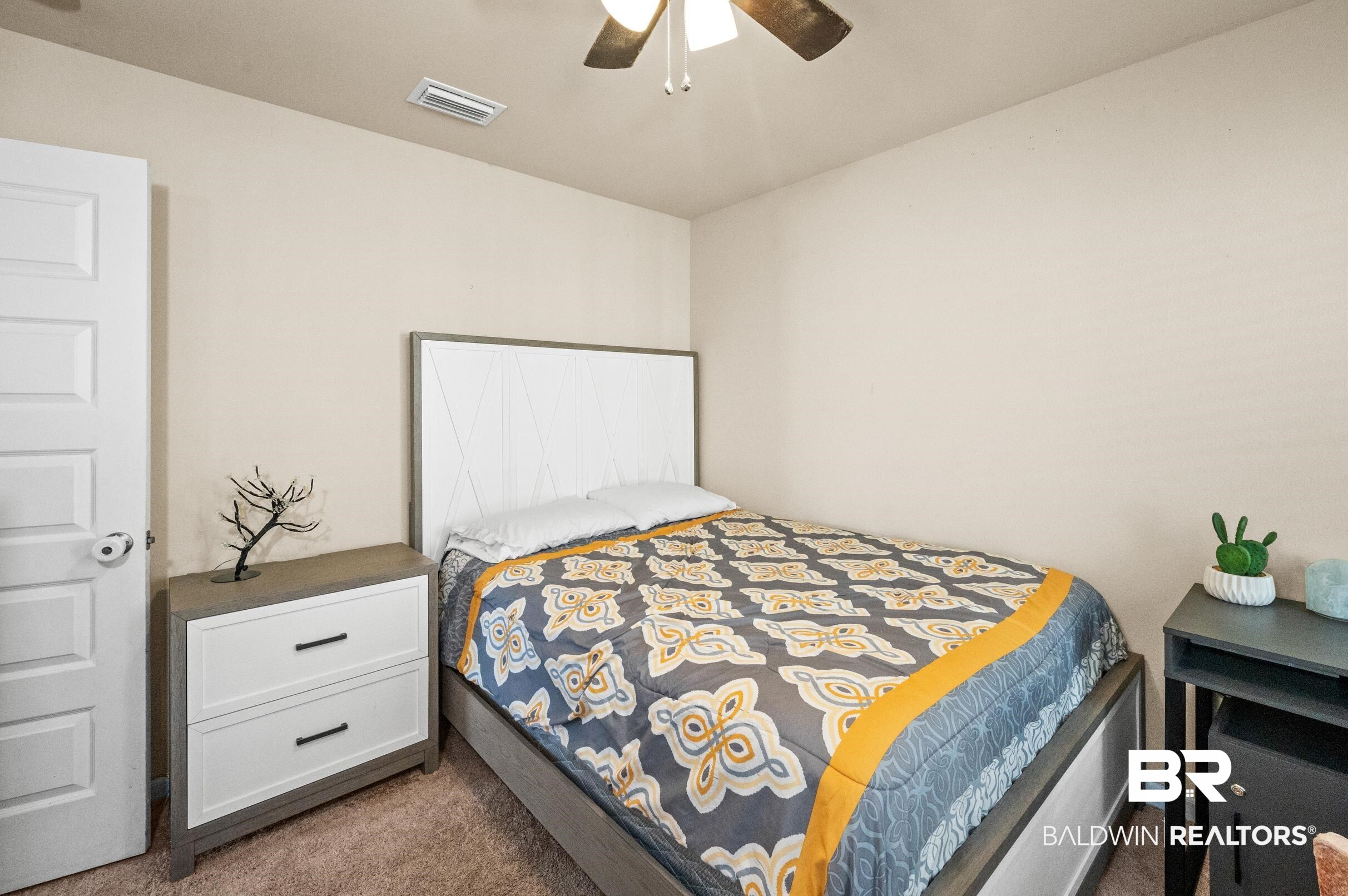 17449 Harding Drive Foley, AL 36535 - Photo 20 of 52 Carpeted bedroom featuring ceiling fan